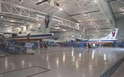 Image of aircraft in hanger having maintence done
